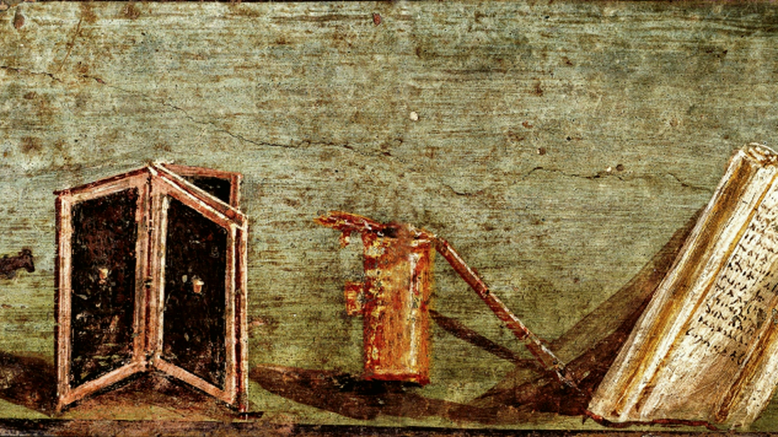 A fresco showing ancient writing tablets and writing tools